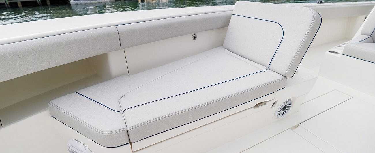 Spacious Lounge Seating: Optional bow loungers with adjustable back-rests feature and insulated storage.